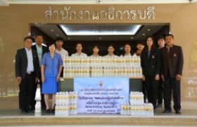 Image : RMUTL offering water to Phrabat Nampu temple.